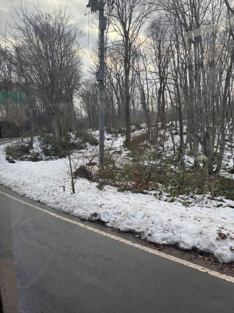 View of snowy Hakkoda mountains from the Sukayu Onsen shuttle bus in Aomori, Japan.