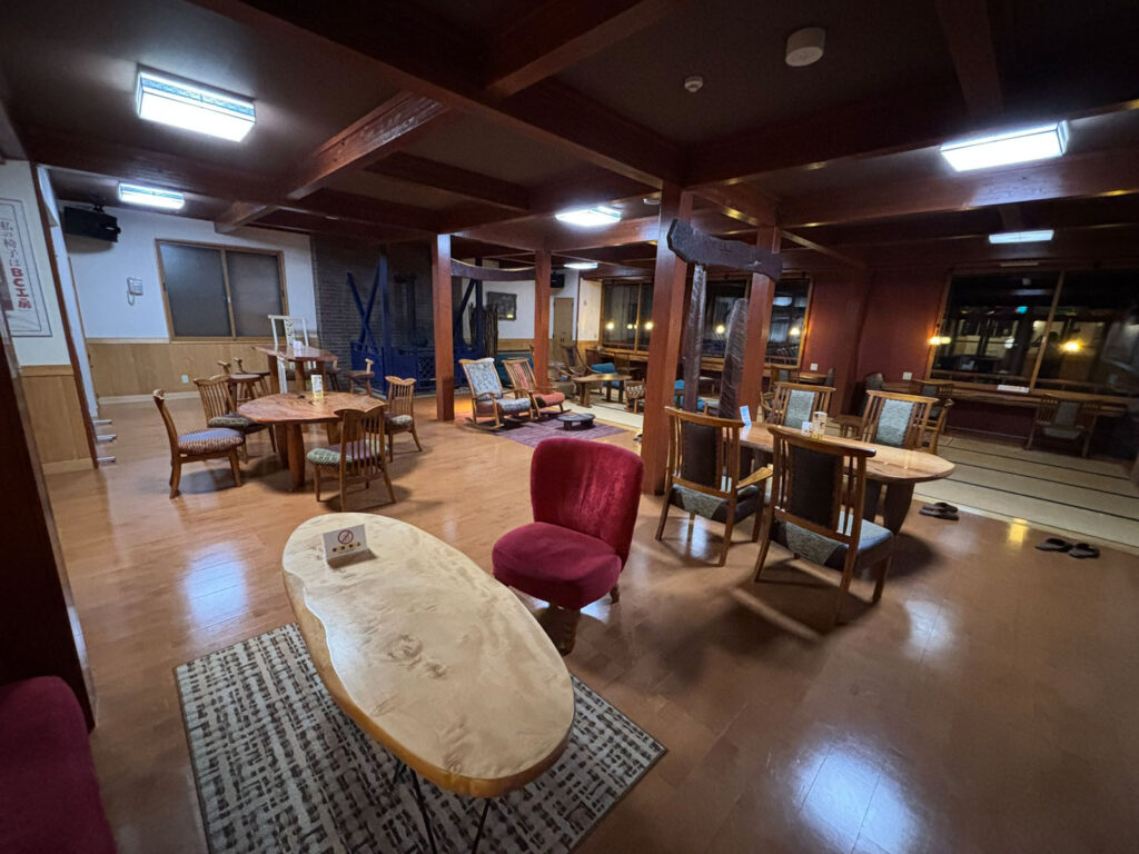 Quiet lounge area at Sukayu Onsen where guests read, nap, and relax between baths.